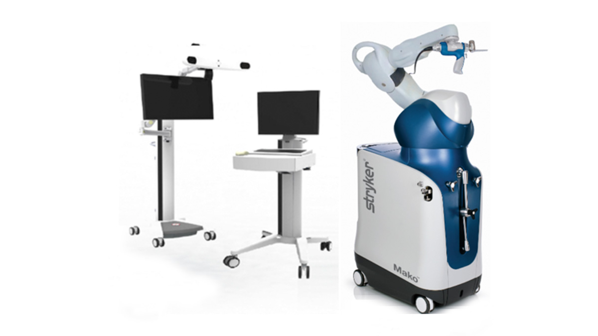 The Mako robotic arm alongside its CT-based planning workstation.