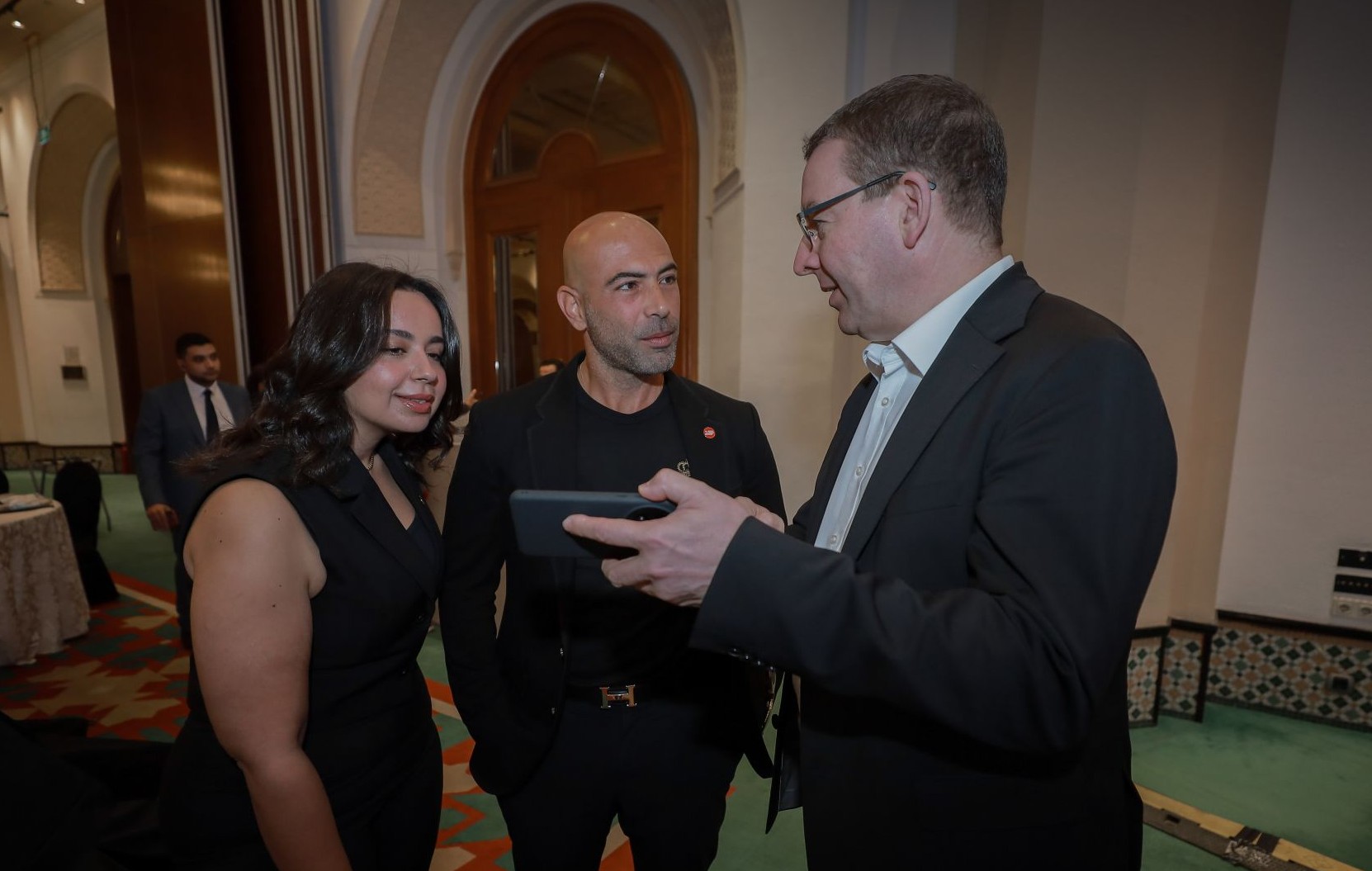 El-Ahlyia Healthcare representatives with a partner